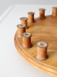 vintage folk art lazy Susan with thread spools