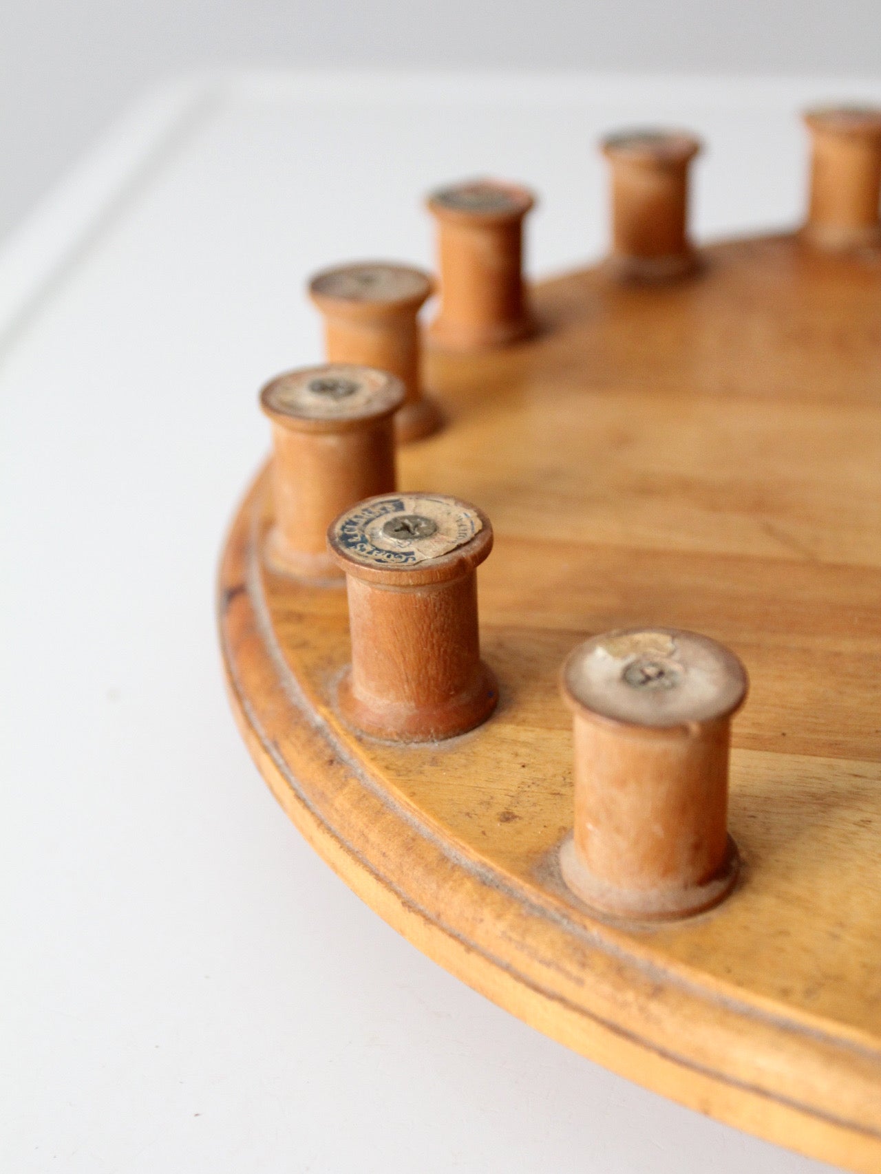 vintage folk art lazy Susan with thread spools