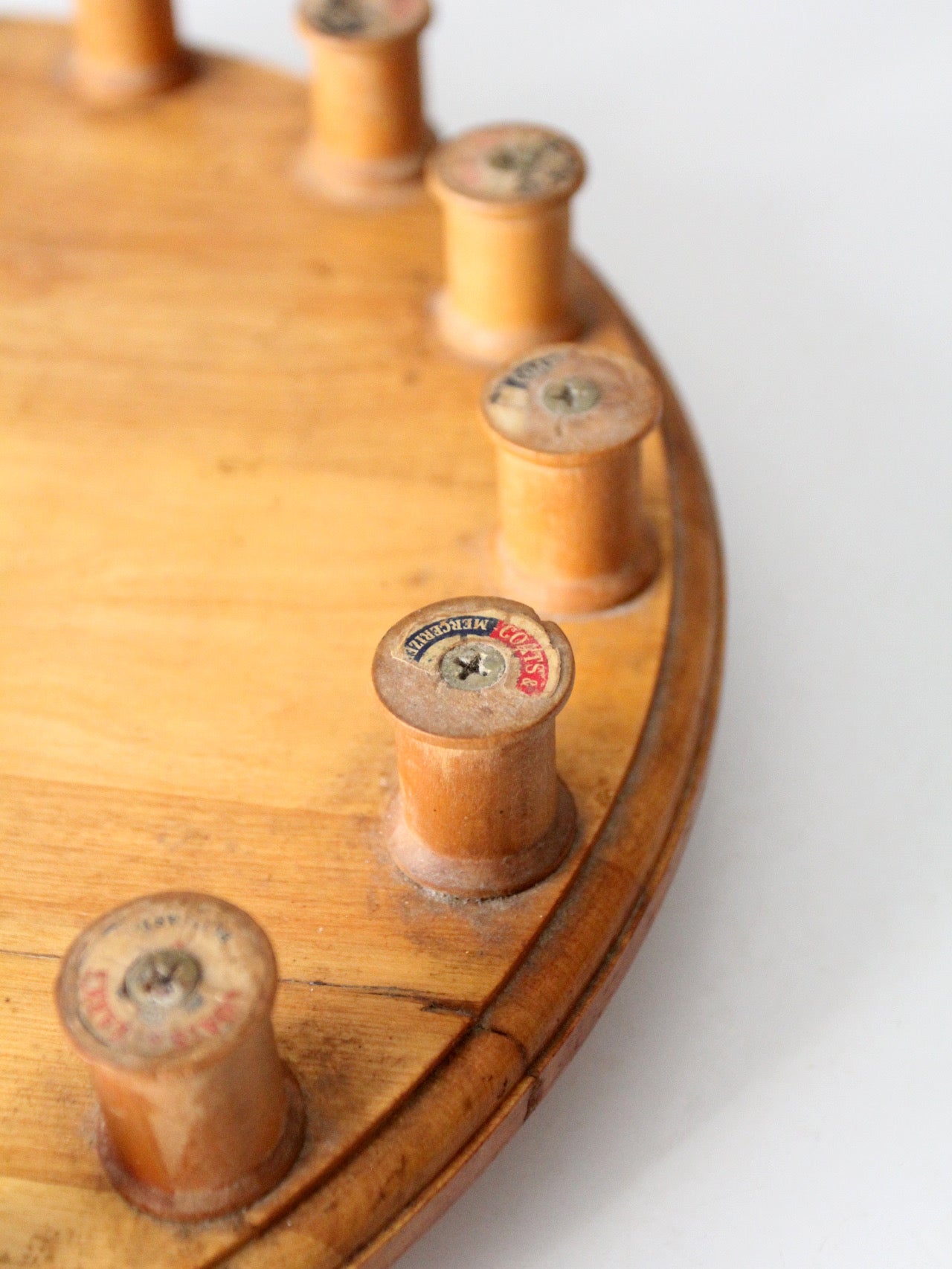 vintage folk art lazy Susan with thread spools