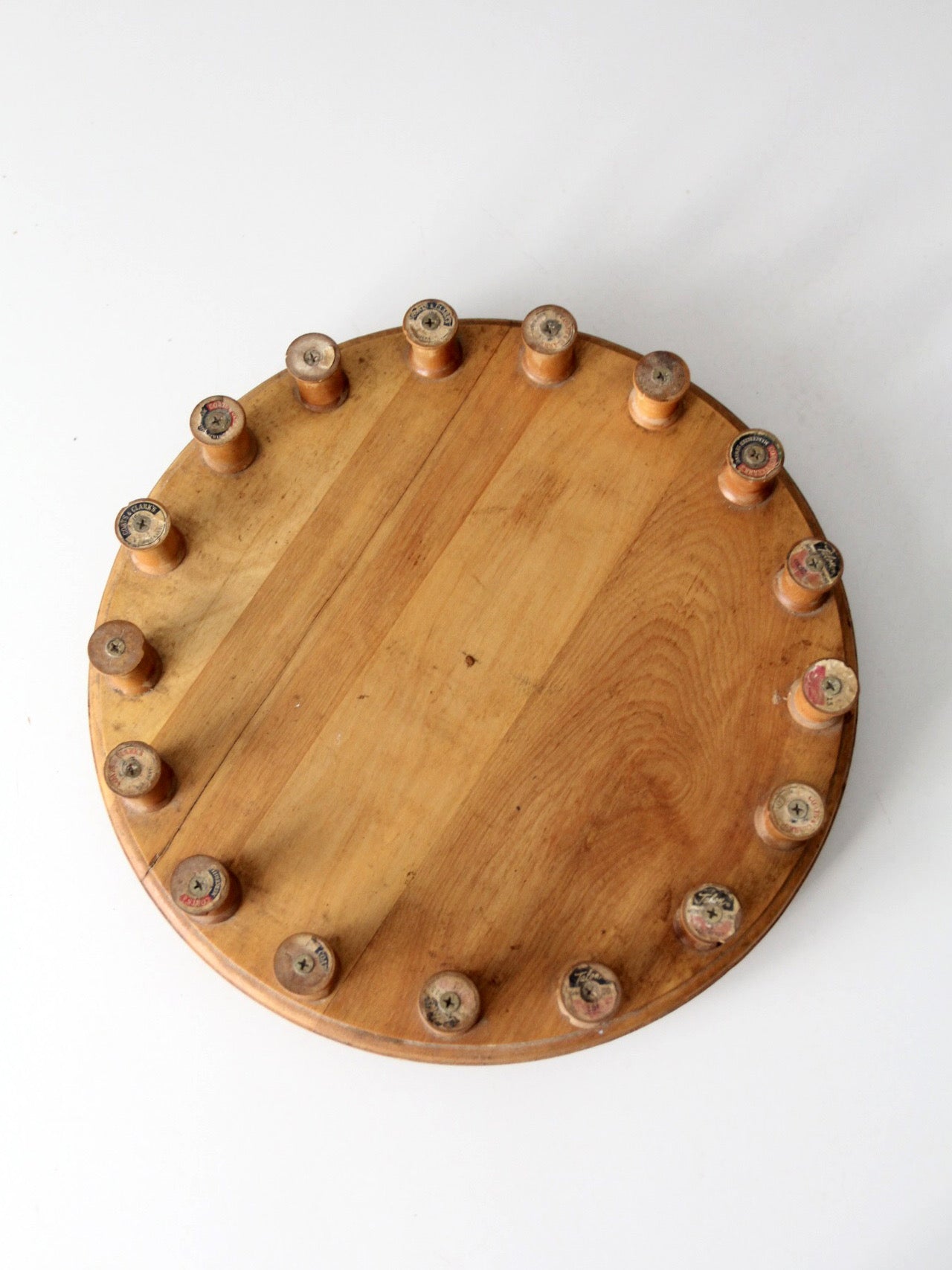 vintage folk art lazy Susan with thread spools