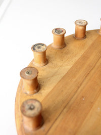 vintage folk art lazy Susan with thread spools