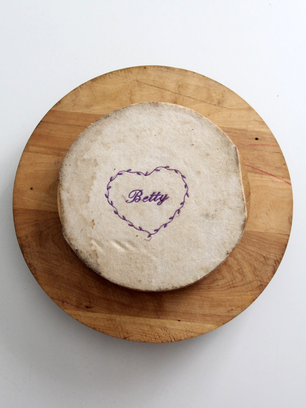 vintage folk art lazy Susan with thread spools