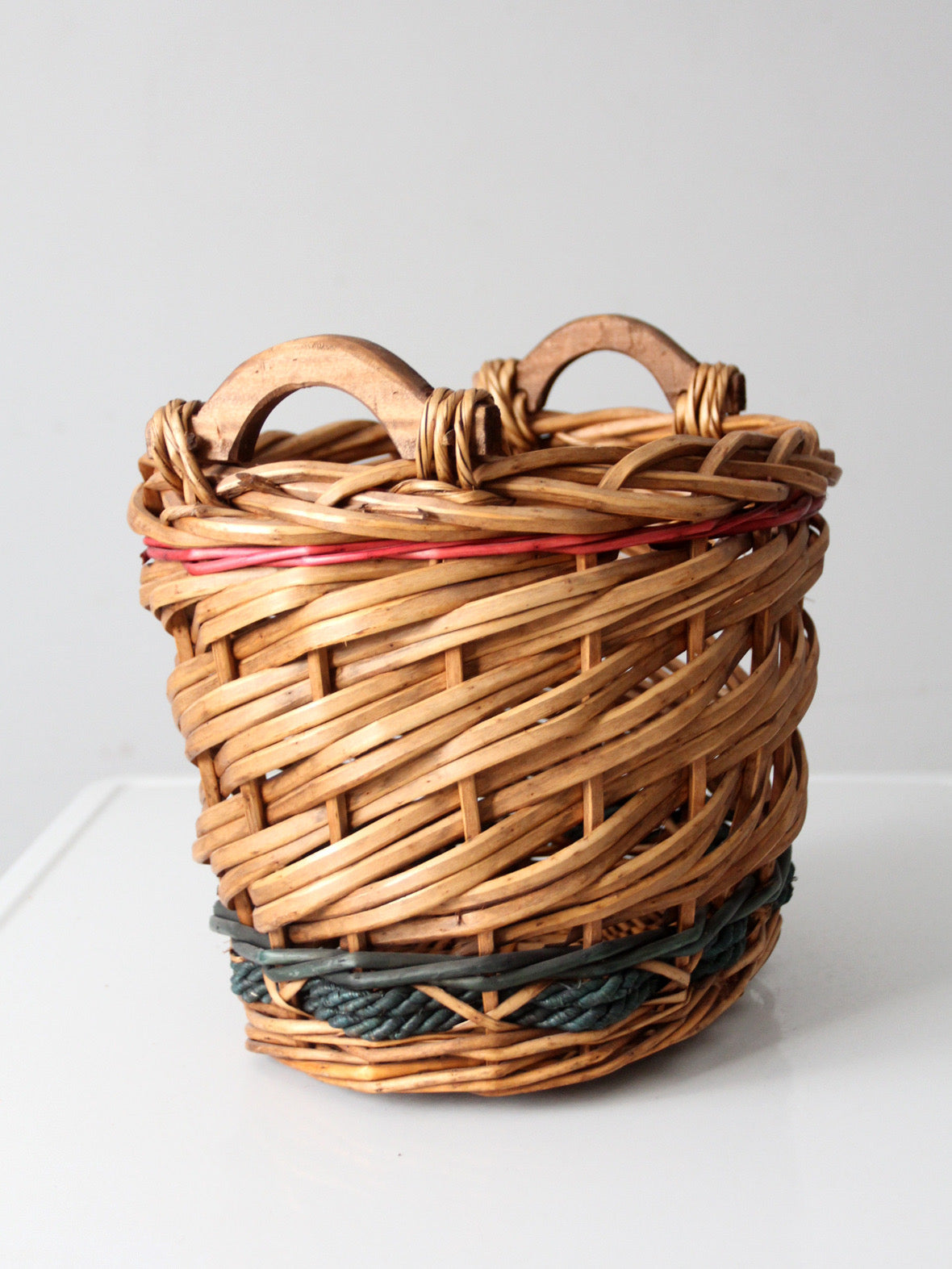 vintage woven basket with red and green
