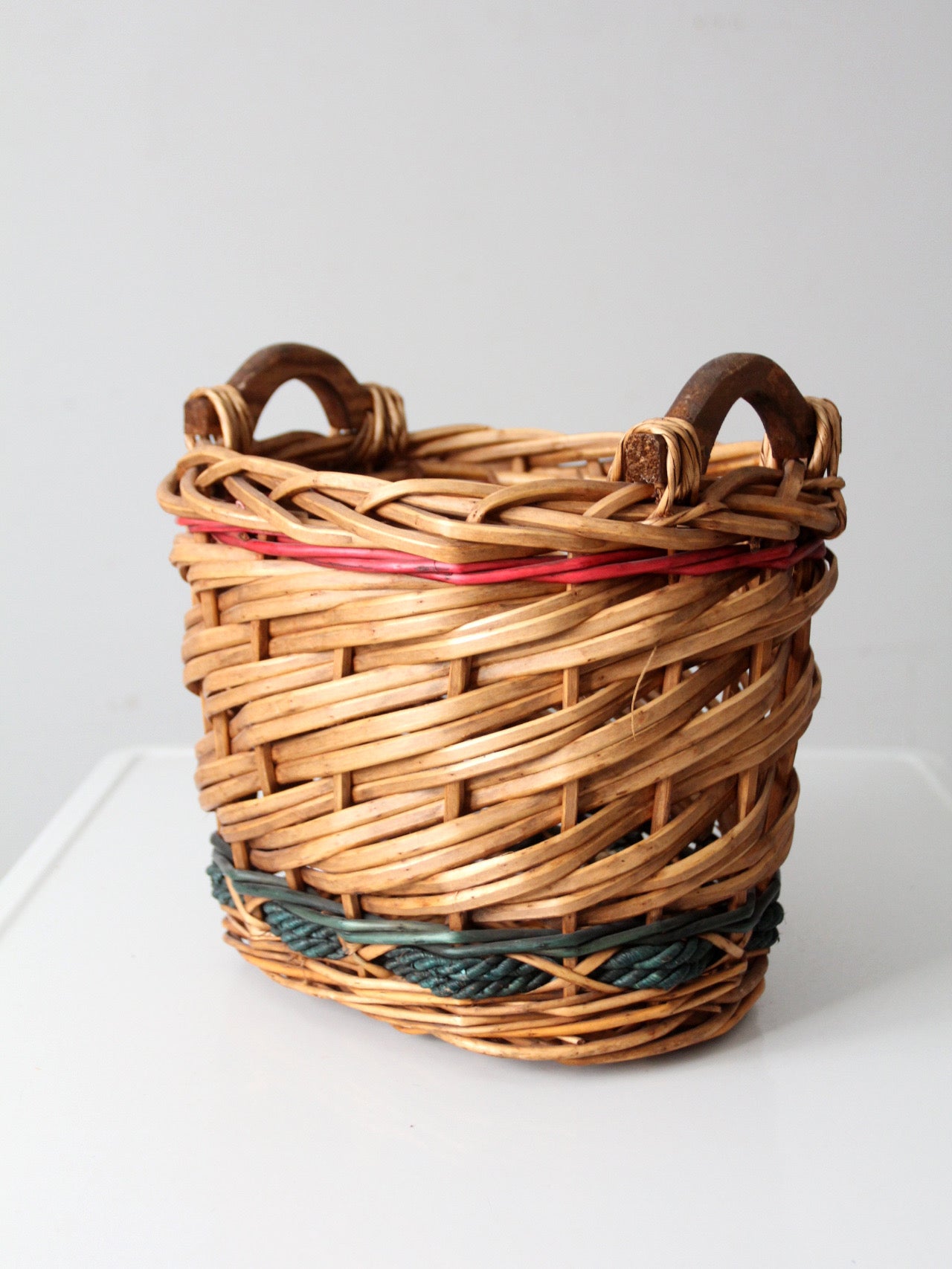 vintage woven basket with red and green