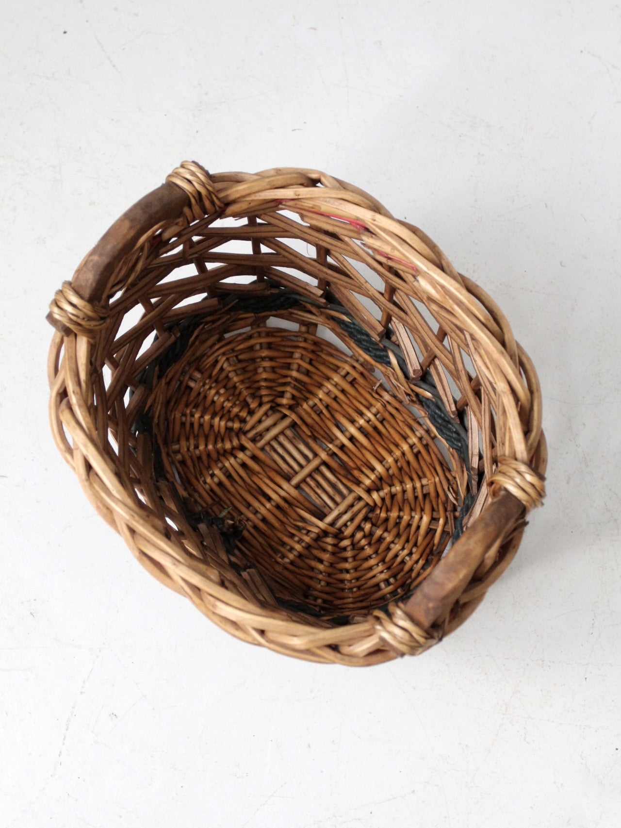 vintage woven basket with red and green