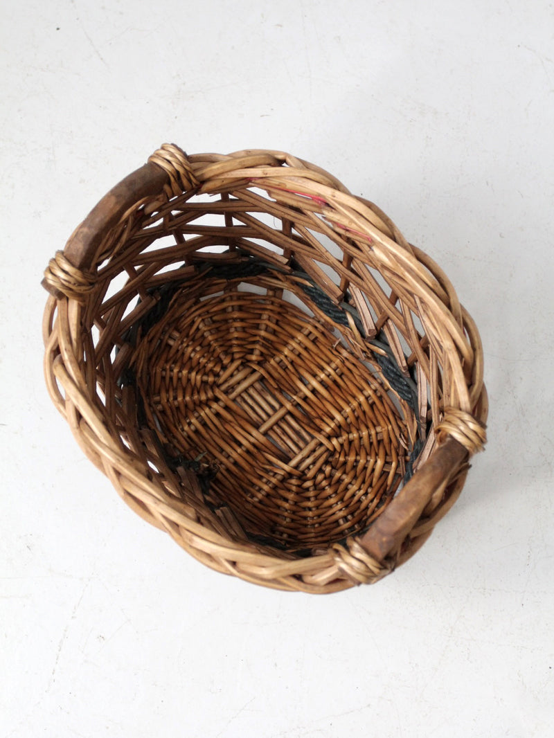 vintage woven basket with red and green