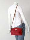 Dooney & Bourke red pebble leather domed crossbody bag