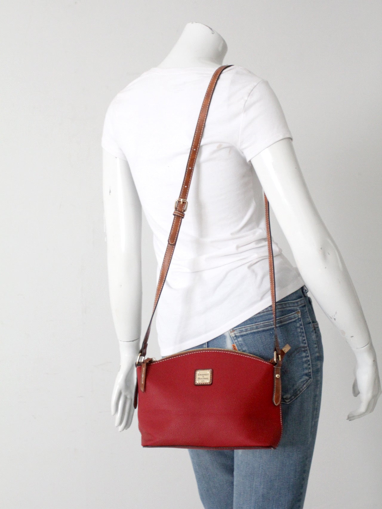 Dooney & Bourke red pebble leather domed crossbody bag
