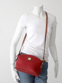 Dooney & Bourke red pebble leather domed crossbody bag