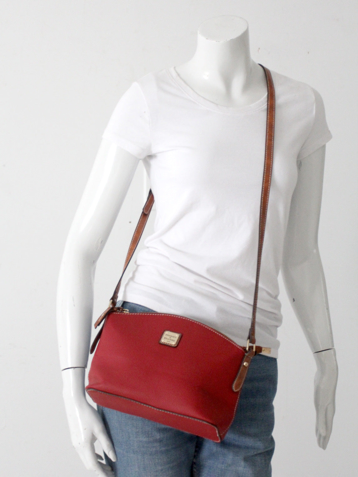 Dooney & Bourke red pebble leather domed crossbody bag