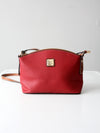 Dooney & Bourke red pebble leather domed crossbody bag