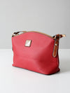 Dooney & Bourke red pebble leather domed crossbody bag