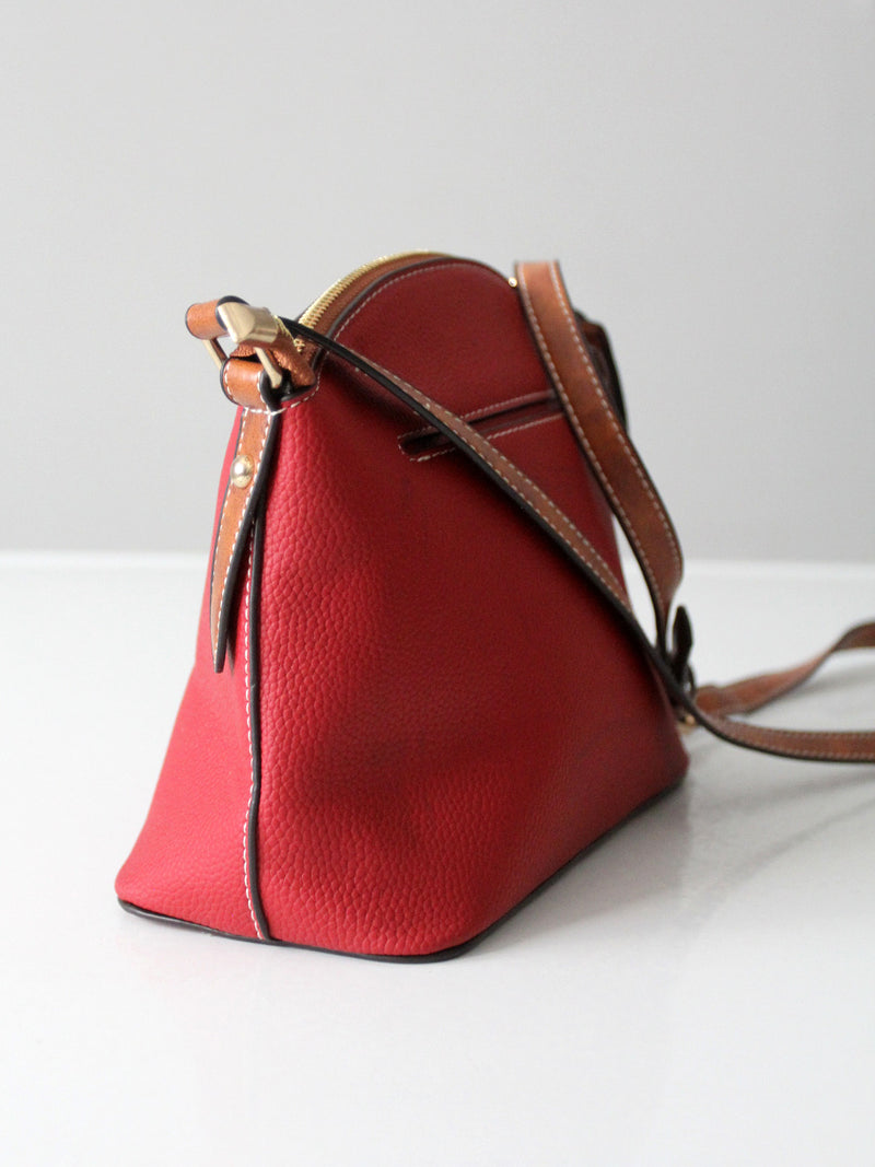 Dooney & Bourke red pebble leather domed crossbody bag