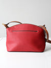 Dooney & Bourke red pebble leather domed crossbody bag