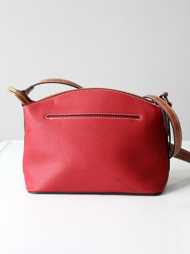 Dooney & Bourke red pebble leather domed crossbody bag