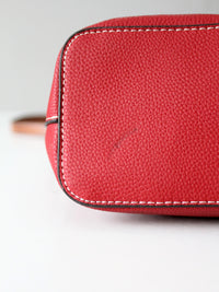 Dooney & Bourke red pebble leather domed crossbody bag