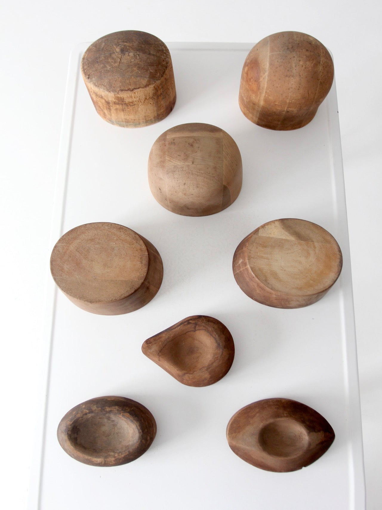 collection of antique wooden millinery hat blocks & forms