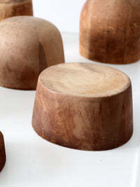 collection of antique wooden millinery hat blocks & forms