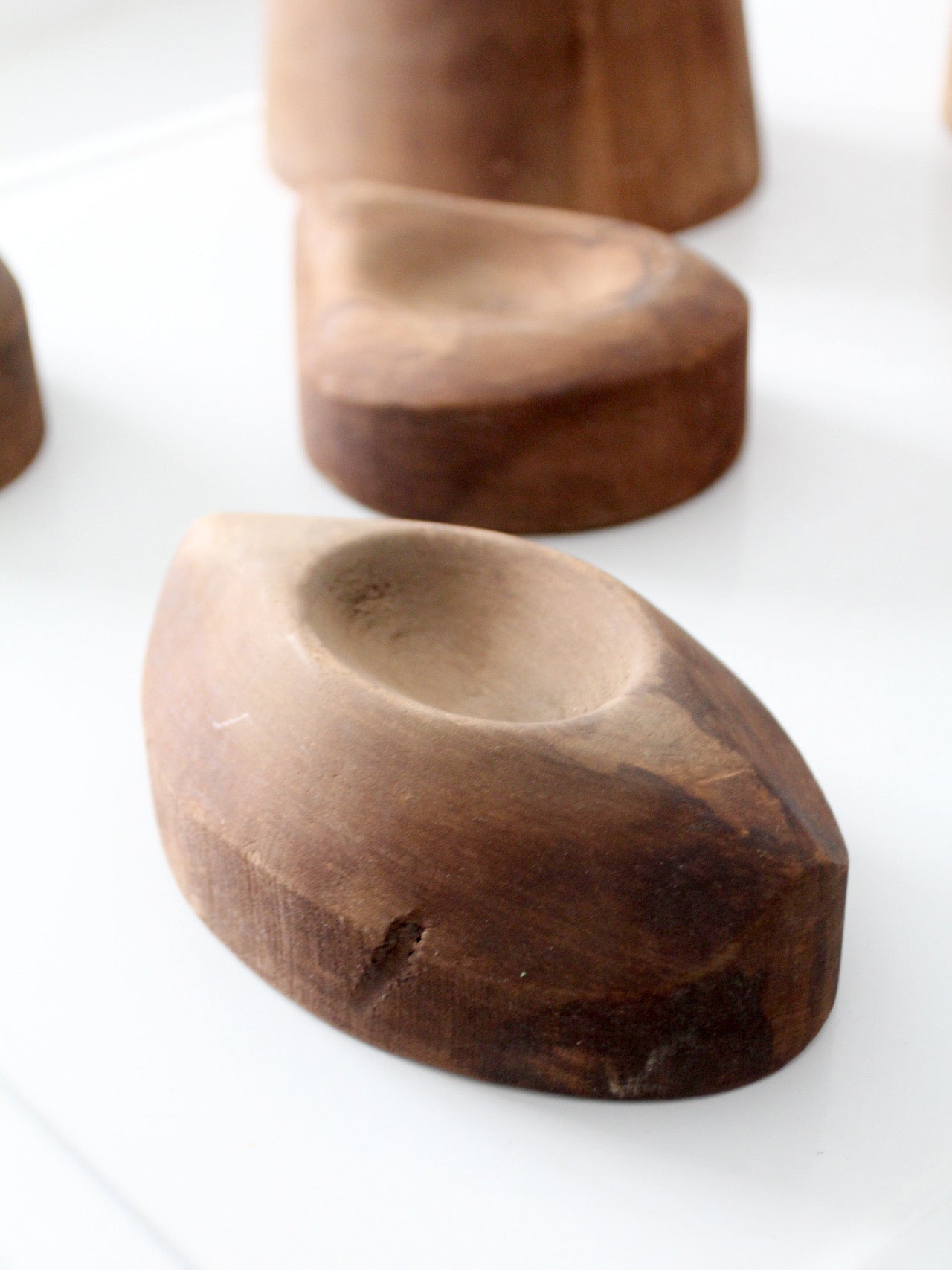 collection of antique wooden millinery hat blocks & forms