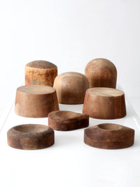 collection of antique wooden millinery hat blocks & forms