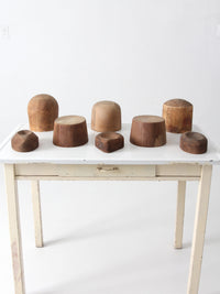 collection of antique wooden millinery hat blocks & forms