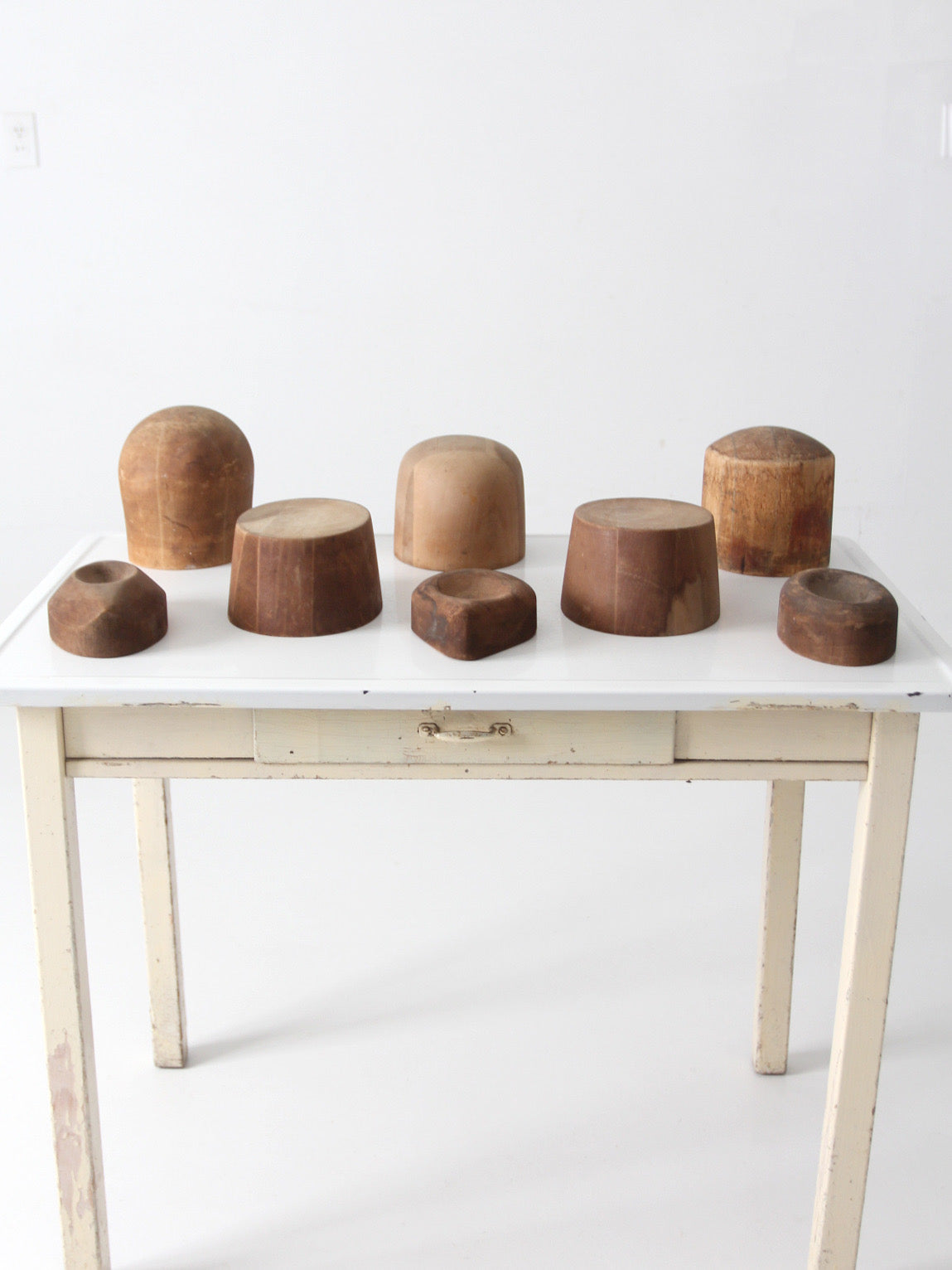 collection of antique wooden millinery hat blocks & forms