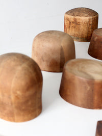 collection of antique wooden millinery hat blocks & forms