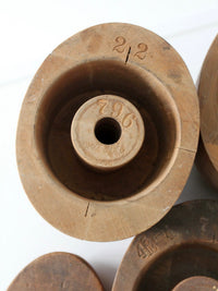 collection of antique wooden millinery hat blocks & forms