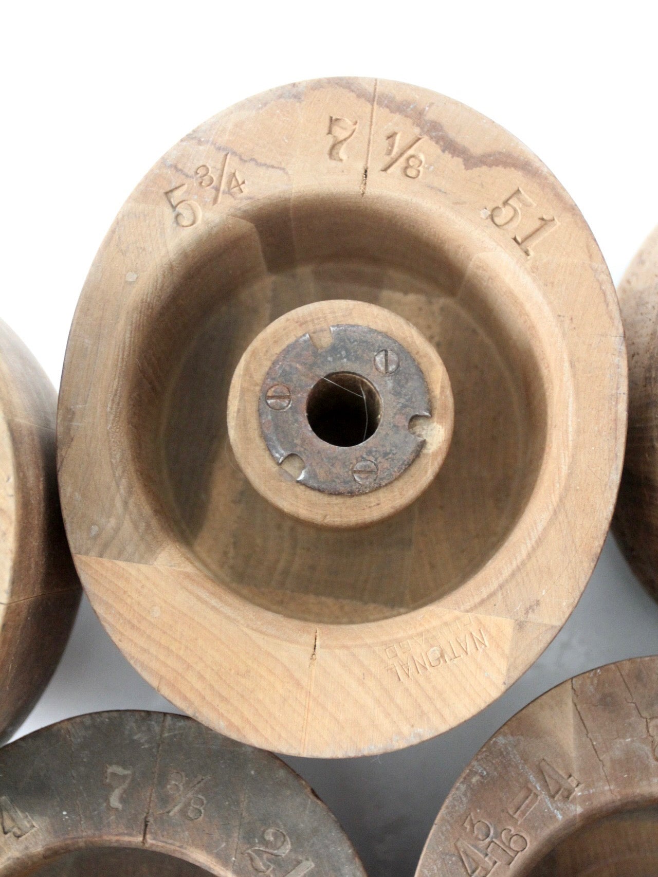 collection of antique wooden millinery hat blocks & forms