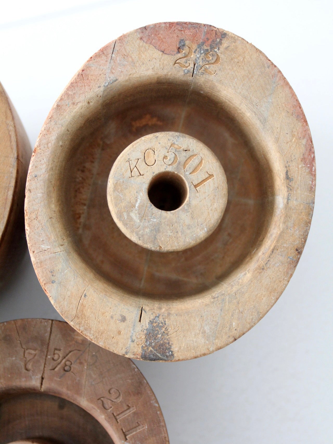 collection of antique wooden millinery hat blocks & forms