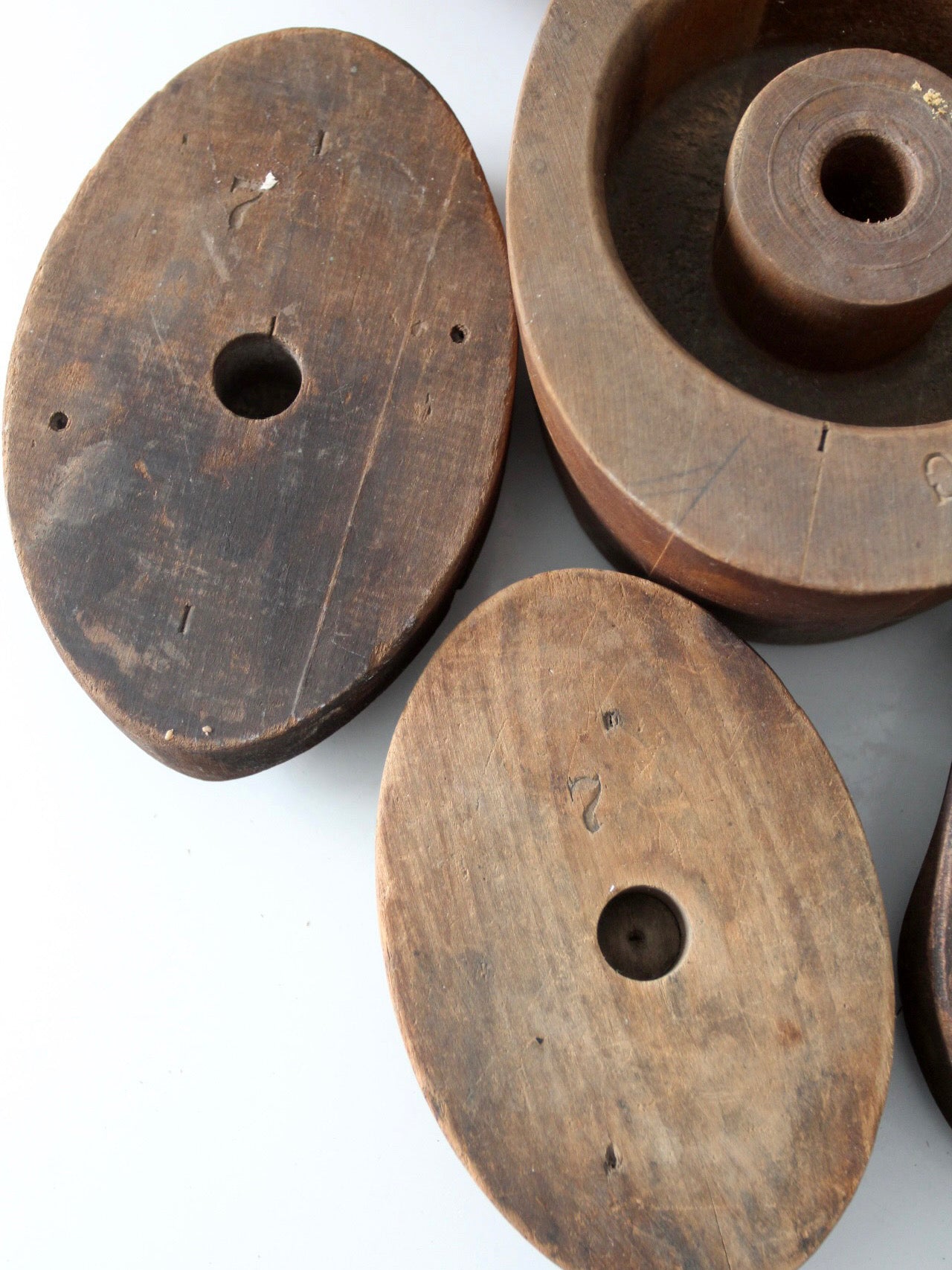 collection of antique wooden millinery hat blocks & forms