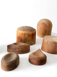 collection of antique wooden millinery hat blocks & forms