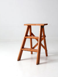 vintage orange wooden step ladder