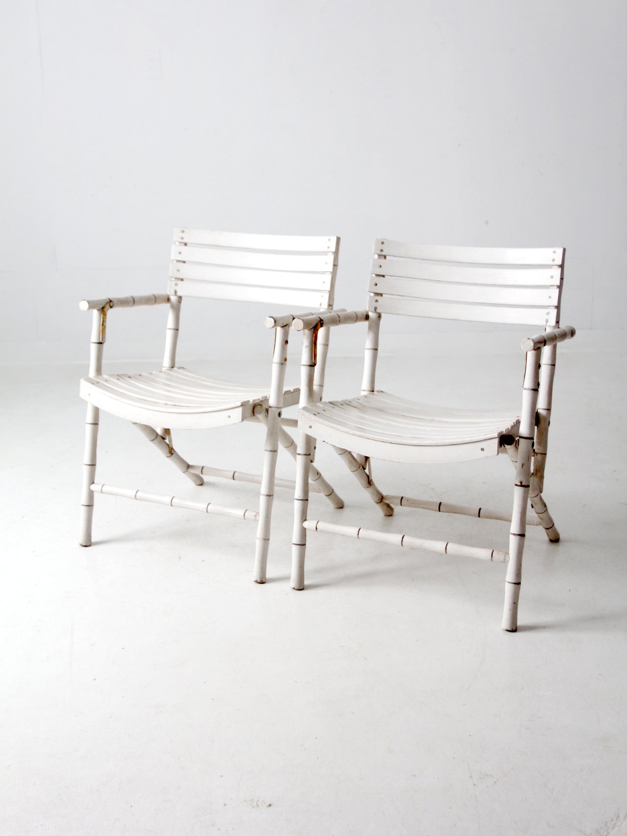 vintage white faux bamboo folding chairs pair