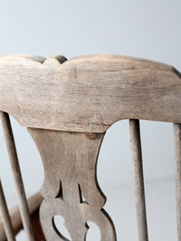 antique wooden rocking chair with upholstered seat