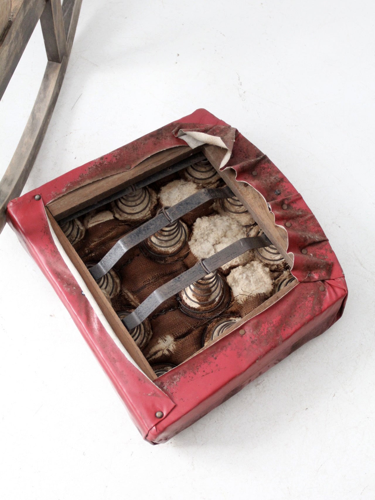 antique wooden rocking chair with upholstered seat