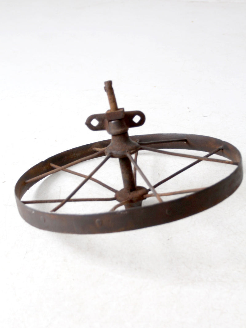 antique iron cart wheel