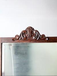 antique Victorian dresser with beveled glass mirror