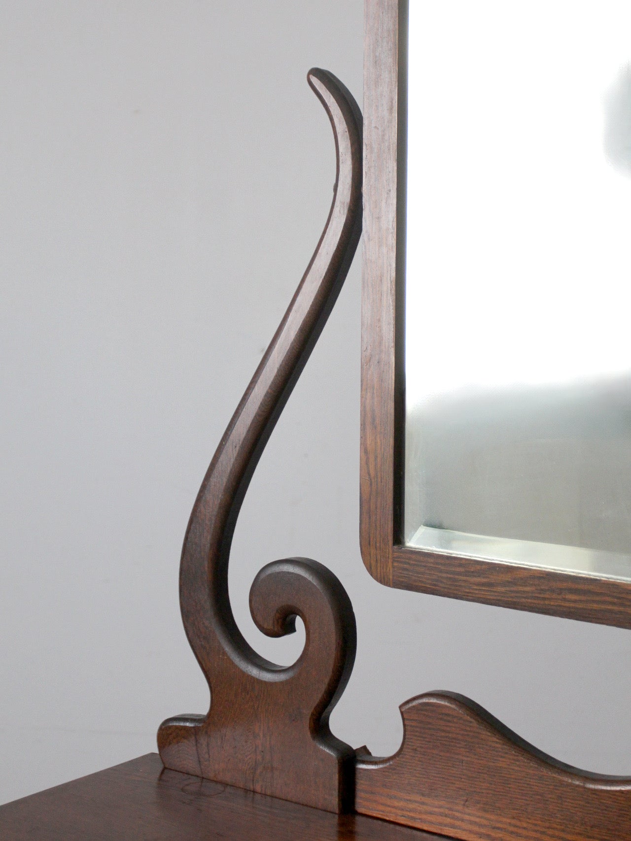 antique Victorian dresser with beveled glass mirror