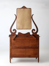 antique Victorian dresser with beveled glass mirror