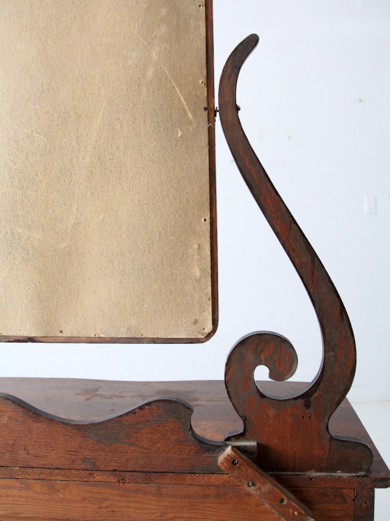 antique Victorian dresser with beveled glass mirror