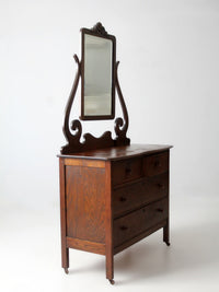 antique Victorian dresser with beveled glass mirror