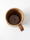 vintage studio pottery mug with fleur-di-lis