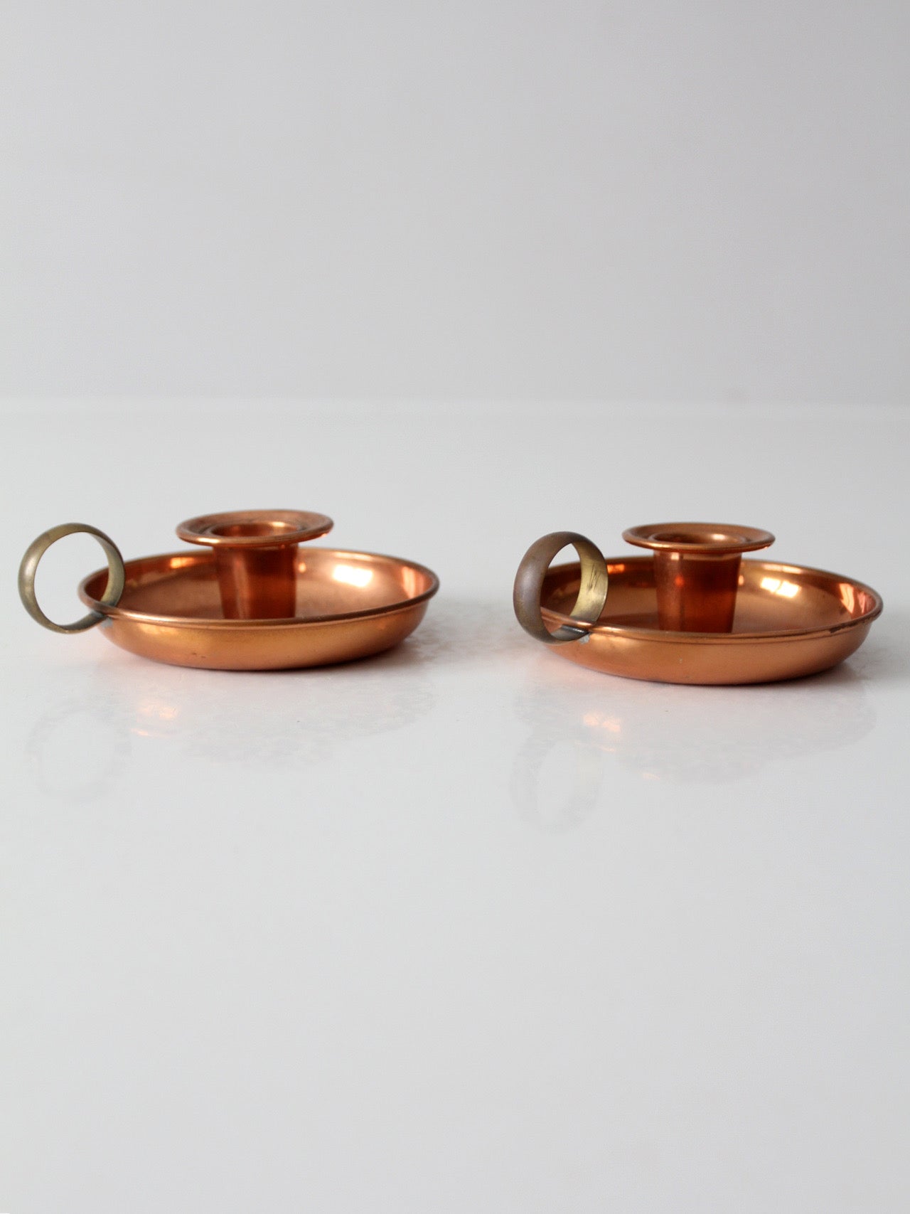 pair of vintage copper and brass chamberstick candlesticks