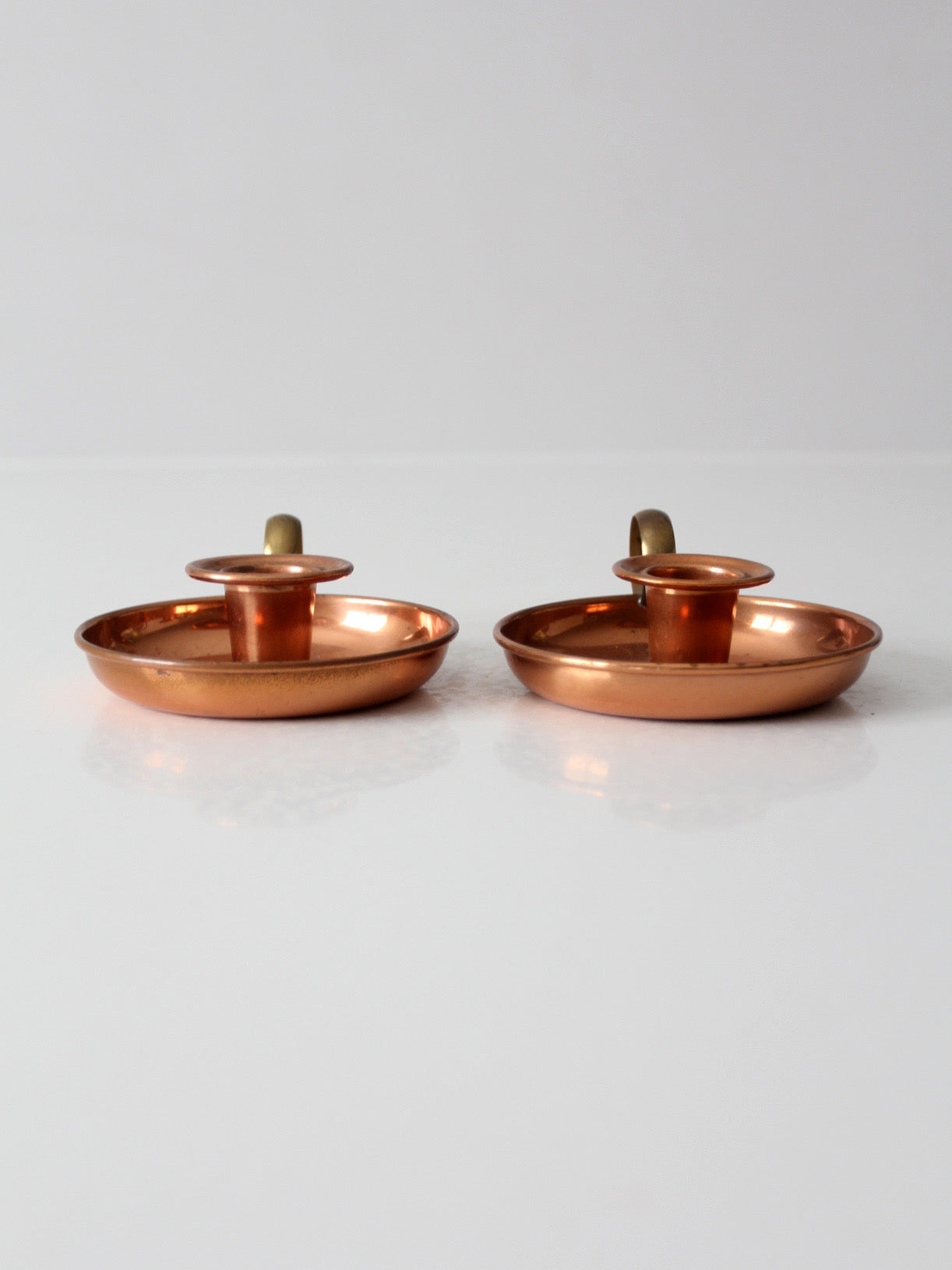 pair of vintage copper and brass chamberstick candlesticks