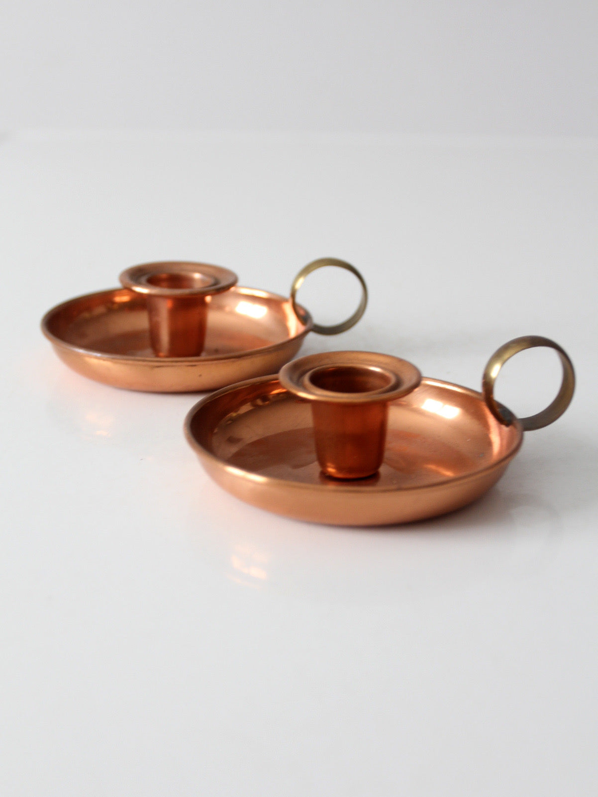pair of vintage copper and brass chamberstick candlesticks