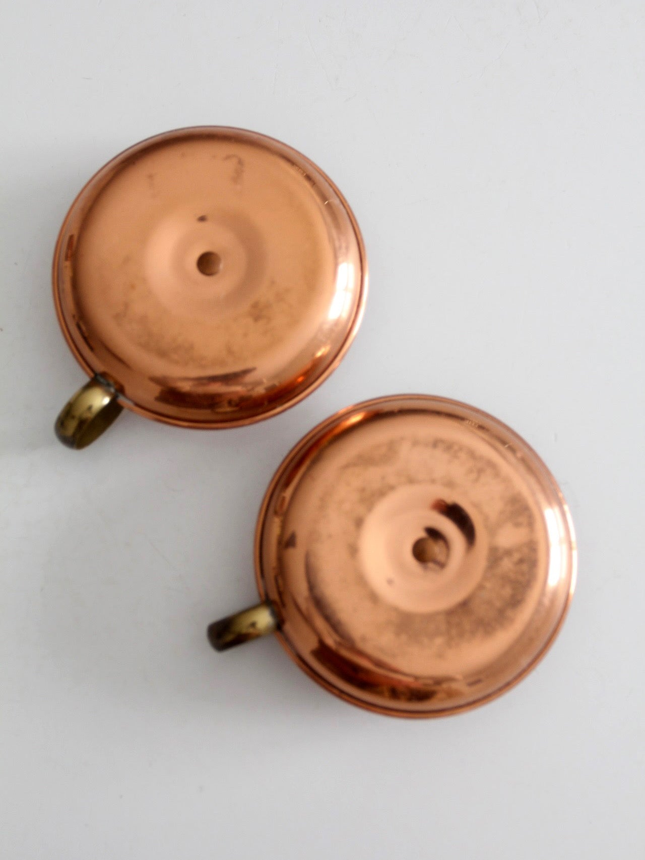pair of vintage copper and brass chamberstick candlesticks