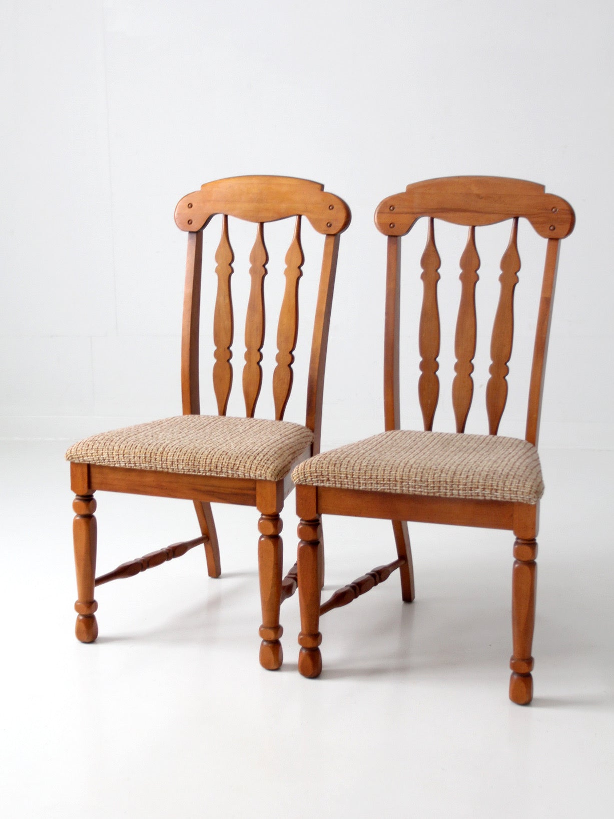 pair of mid-century Singer Furniture wood dining chairs with upholstered seats