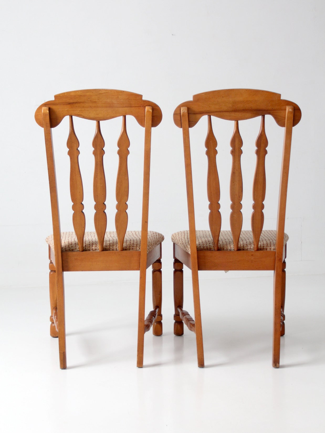pair of mid-century Singer Furniture wood dining chairs with upholstered seats