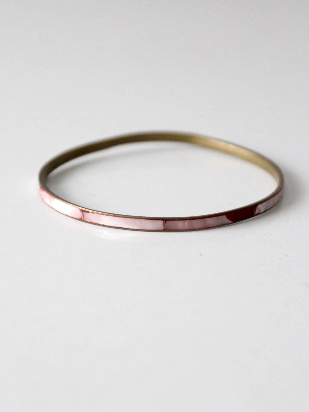 1970s pink shell inlay brass bangle bracelet